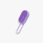 Brosse spray violette pour démêler et nettoyer le pelage des chats et chiens