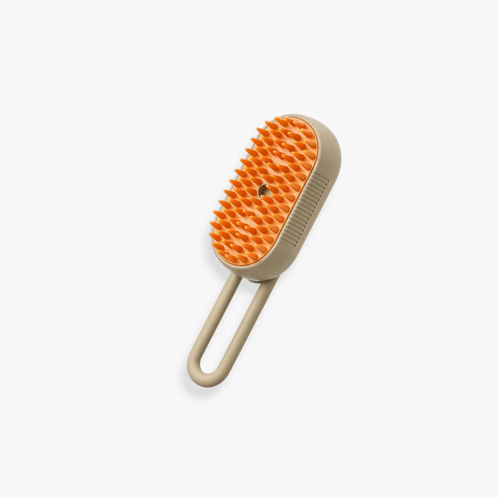 Brosse spray blanche et beige pour le toilettage des chats et chiens