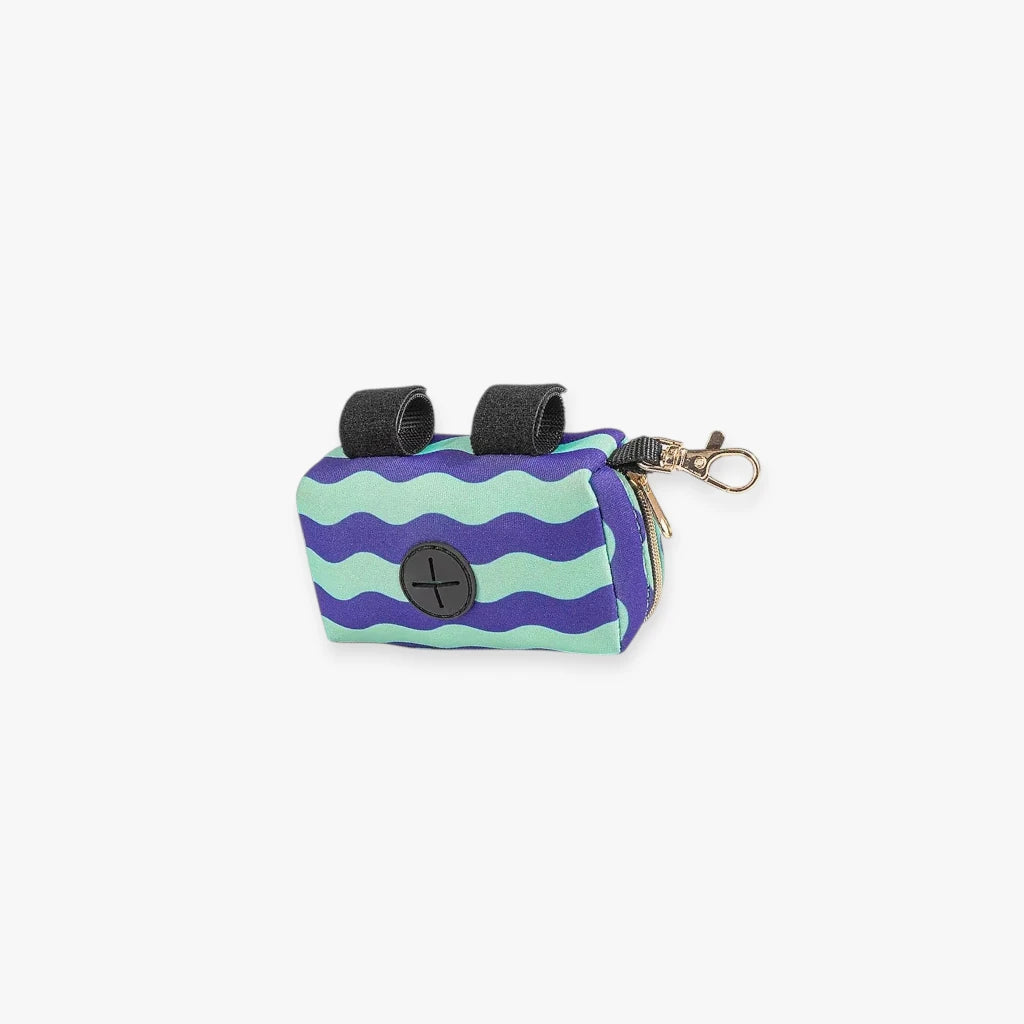 Distributeur de sacs portable pour déjets de chien, design compact et pratique
